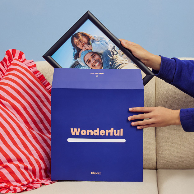 Marco de fotos y su funda de regalo